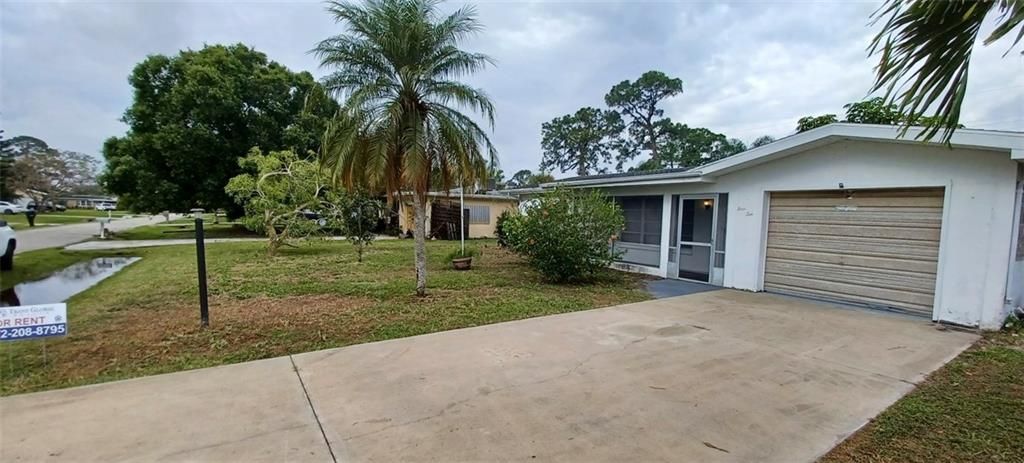 Photo of 410 Poplar Ave, Port Saint Lucie, FL 34952 (MLS # F10376256)