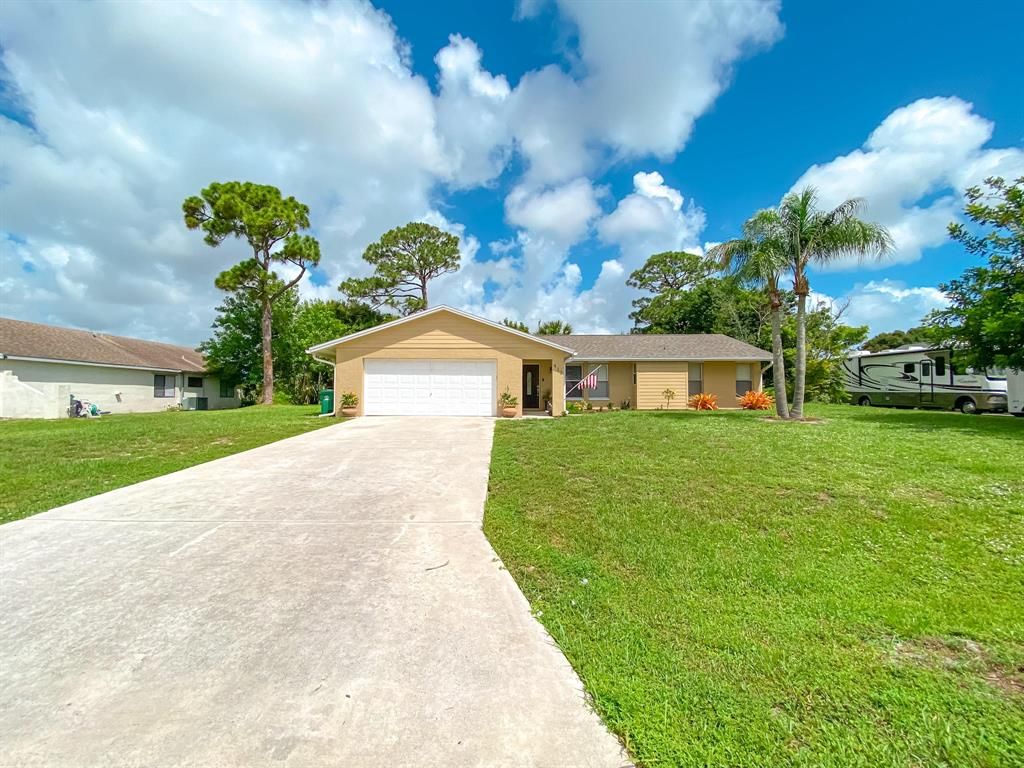 Photo of 413 S Naranja Avenue, Port Saint Lucie, FL 34983 (MLS # R10727615)