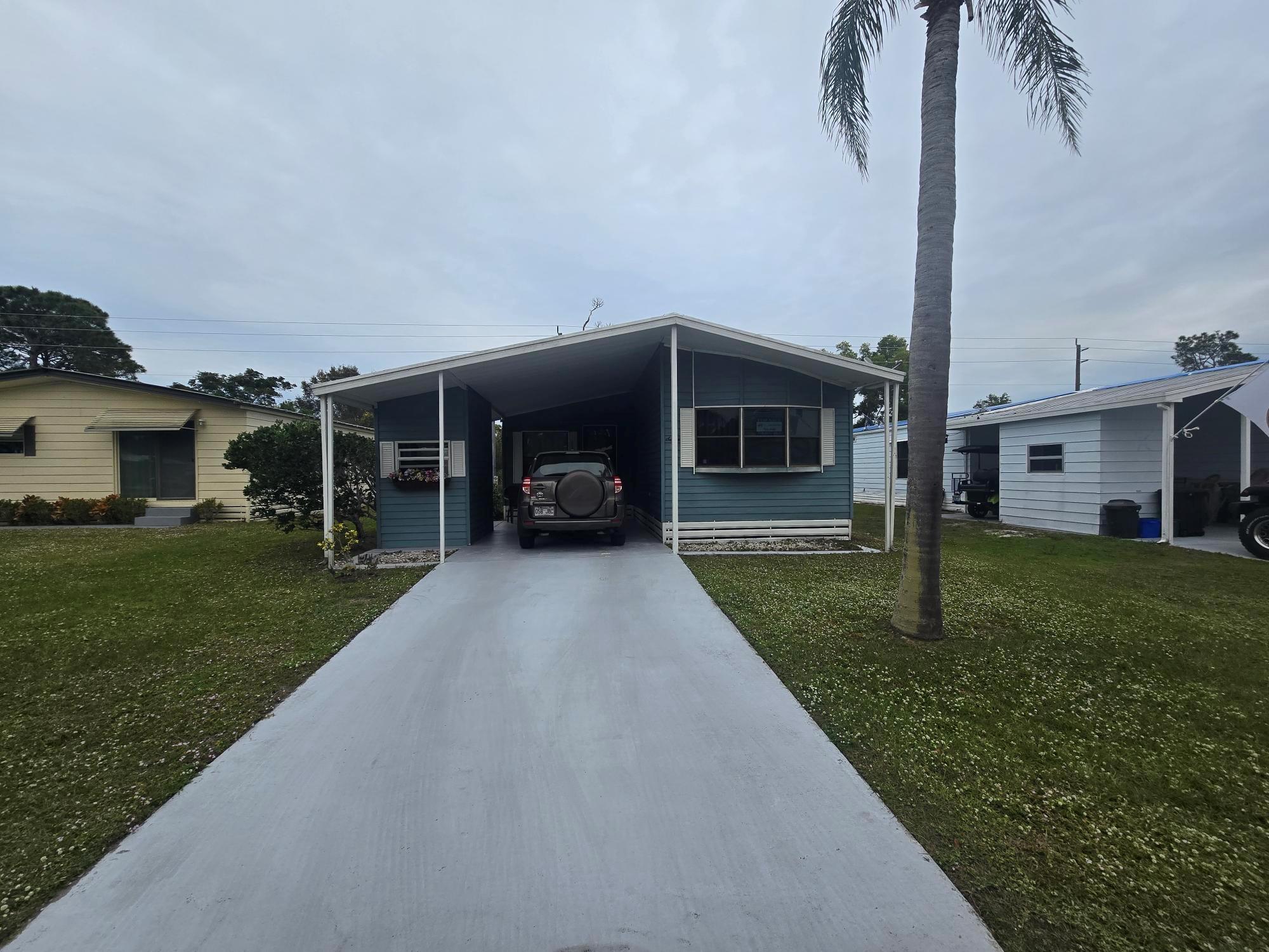 Charming 2 bedroom, 2 bath home with large Florida room, eat in kitchen and dining. Also screened patio and storage room. Newer wood flooring, new roof, newer A/C. Well maintained home, fully furnished and ready to move in. Lawn care is included as well as a plethora of amenities in this wonderful 55+ community.