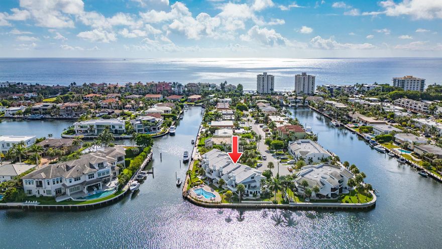 Welcome to Lloret De Mar, your private coastal retreat in the heart of Highland Beach. This waterfront townhome offers direct beach access just across the street, boat dockage, a pristine pool, and breathtaking Intracoastal views. The open-plan living area flows to a waterside patio with a built-in grill, perfect for entertaining. Inside, enjoy a chef's kitchen with custom birds-eye maple cabinetry, Canadian maple hardwood floors, two spacious bedrooms plus a versatile third room with a Murphy bed, and a luxurious primary suite with soaring ceilings, two private balconies, and a sunlit loft terrace ideal for a dressing room, office, or yoga space. Additional highlights include a one-car garage, 2023 roof, and freshly painted exterior. Ideally located near Boca Raton, Delray Beach,