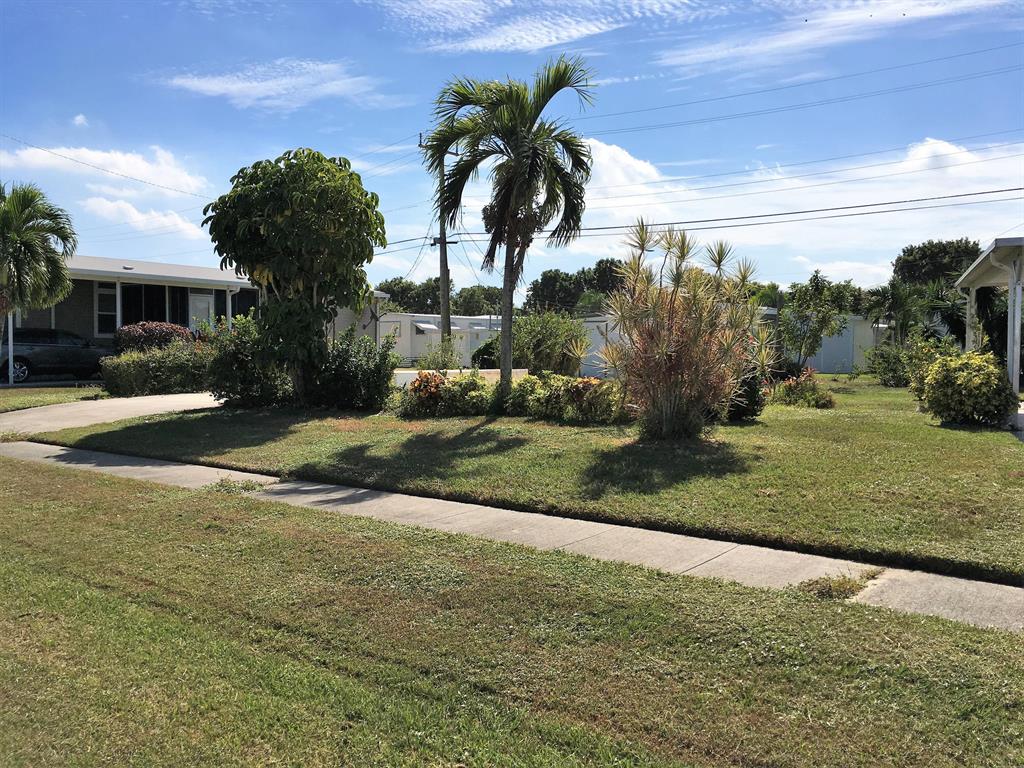 Own your deeded lot in Tropical Breeze Mobile / Manufacturer Park. 55+ community in Boynton Beach, South Florida. Lot sold as is with nice landscaping, 10X7 shed and cement driveway. The ~90X65 lot can received a single or double wide manufacturer home at your own expense. Call for an appointment.