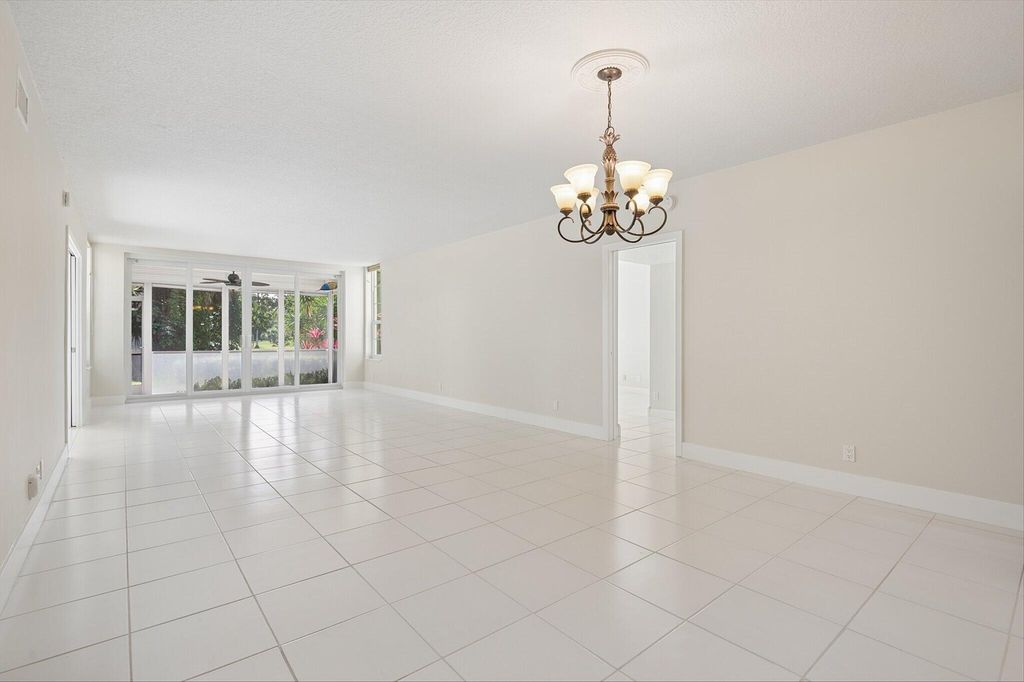 Photo of 804 Cypress Grove Lane #104, Pompano Beach, FL 33069 (MLS # B26026145)