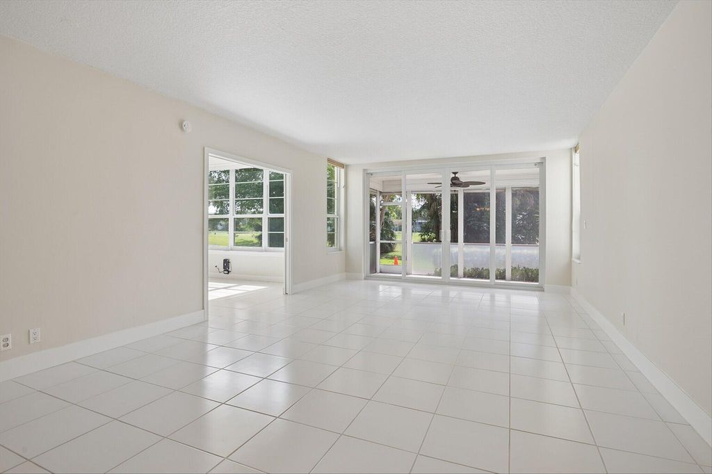 Photo of 804 Cypress Grove Lane #104, Pompano Beach, FL 33069 (MLS # B26026145)