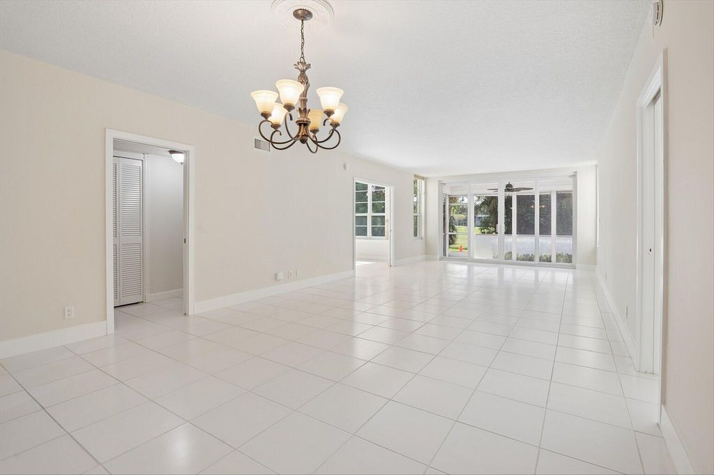Photo of 804 Cypress Grove Lane #104, Pompano Beach, FL 33069 (MLS # B26026145)