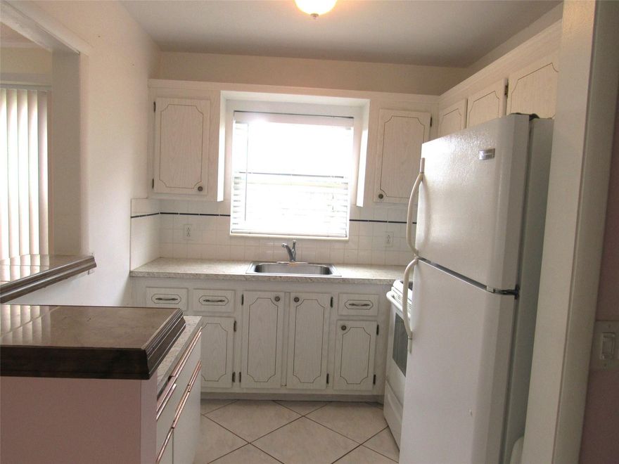 PRICED TO SELL...LIGHT & BRIGHT 2ND FLOOR CORNER WITH CENTRAL A/C! WELL MAINTAINED CONDO.  NO CARPET, NO DOME!  WOOD LAMINATE FLOORS IN LIVINGROOM AND BEDROOM. TILE IN KITCHEN & DININGROOM AREA. A/C INSTALLED 2019. ENCLOSED PATIO WITH REFURBISHED SCREENS & ENCLOSURE. WALK TO POOL, PICKLEBALL & TENNIS! 5 STAR CLUBHOUSE WITH CLASSES AND CLUBS GALORE! STATE OF THE ART GYM, FREE MOVIES AND WONDERFUL SHOWS! SHUTTLE BUS RUNS EVERY 30 MINS! GATED COMMUNITY 3.5 MILES FROM BEAUTIFUL DEERFIELD BEACH. CLOSE TO GREAT SHOPPING AND FABULOUS RESTAURANTS. BUILDING HAS LOVELY BBQ AREA FOR SOCIAL GATHERINGS BY THE WATER. ENJOY COUNTRY CLUB LIVING AT AN AFFORDABLE PRICE!
