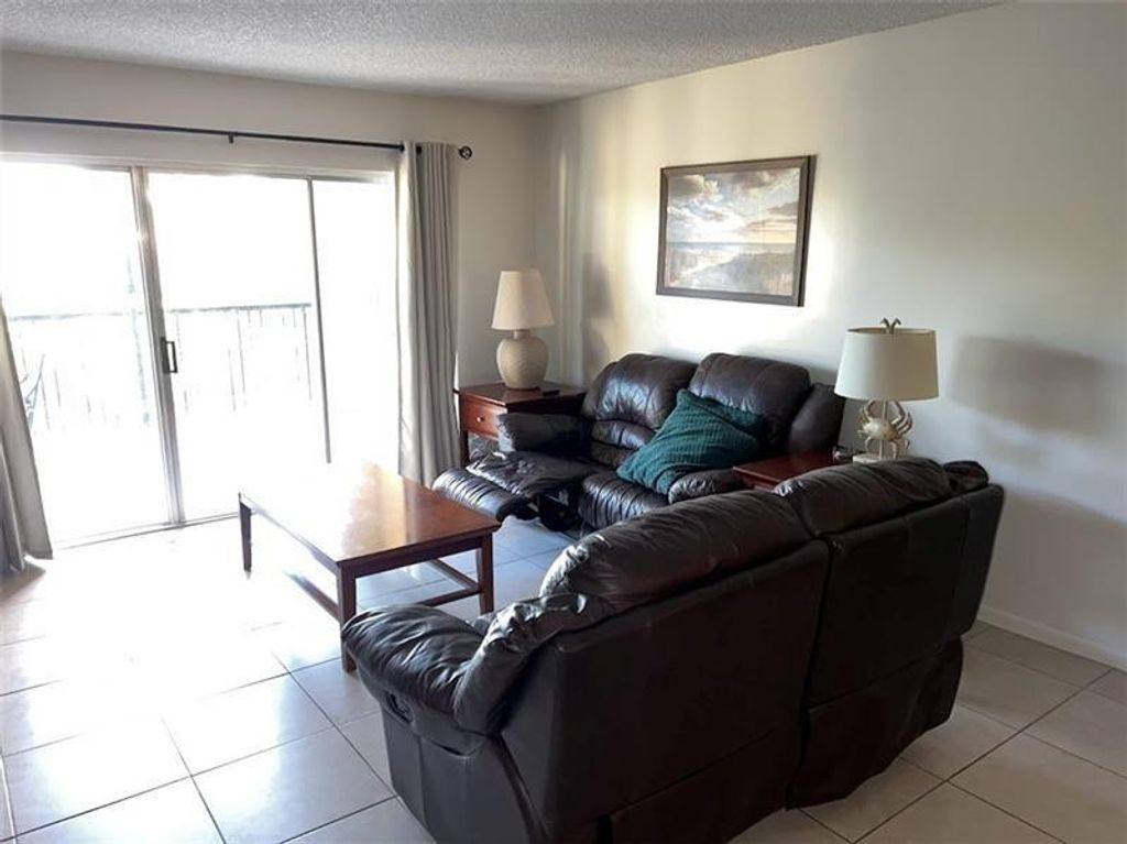 Photo of 4000 Crystal Lake Drive #212, Deerfield Beach, FL 33064 (MLS # F10518206)