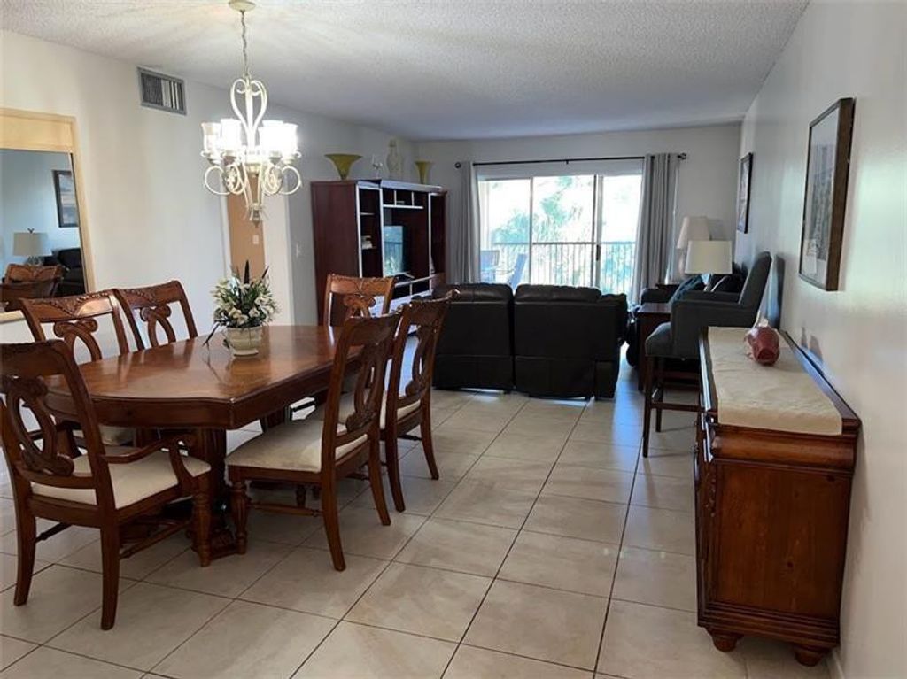 Photo of 4000 Crystal Lake Drive #212, Deerfield Beach, FL 33064 (MLS # F10518206)