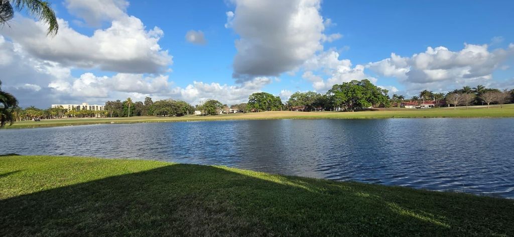 Photo of 566 Village Lake Drive, Weston, FL 33326 (MLS # B26035505)