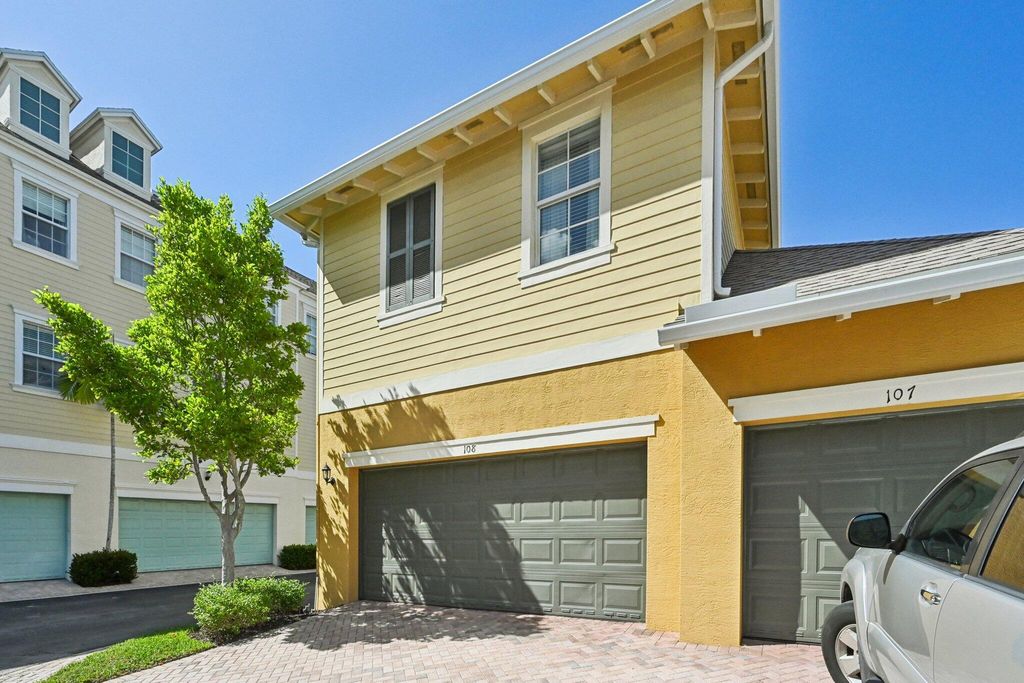 Photo of 110 E Pigeon Plum Drive, Jupiter, FL 33458 (MLS # B26009928)