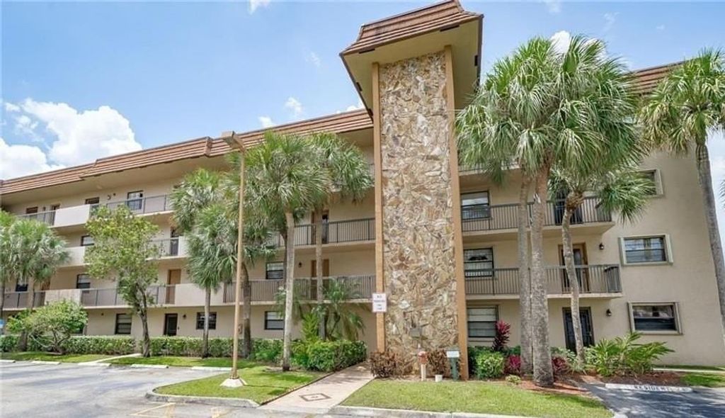 Photo of 4940 E Sabal Palm Boulevard #Ph8, Tamarac, FL 33319 (MLS # B26046012)