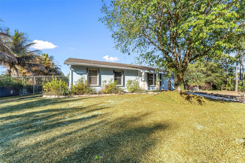 Photo of 12895 Persimmon Boulevard, The Acreage, FL 33411 (MLS # F10550653)