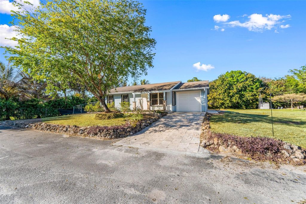 Photo of 12895 Persimmon Boulevard, The Acreage, FL 33411 (MLS # F10550653)