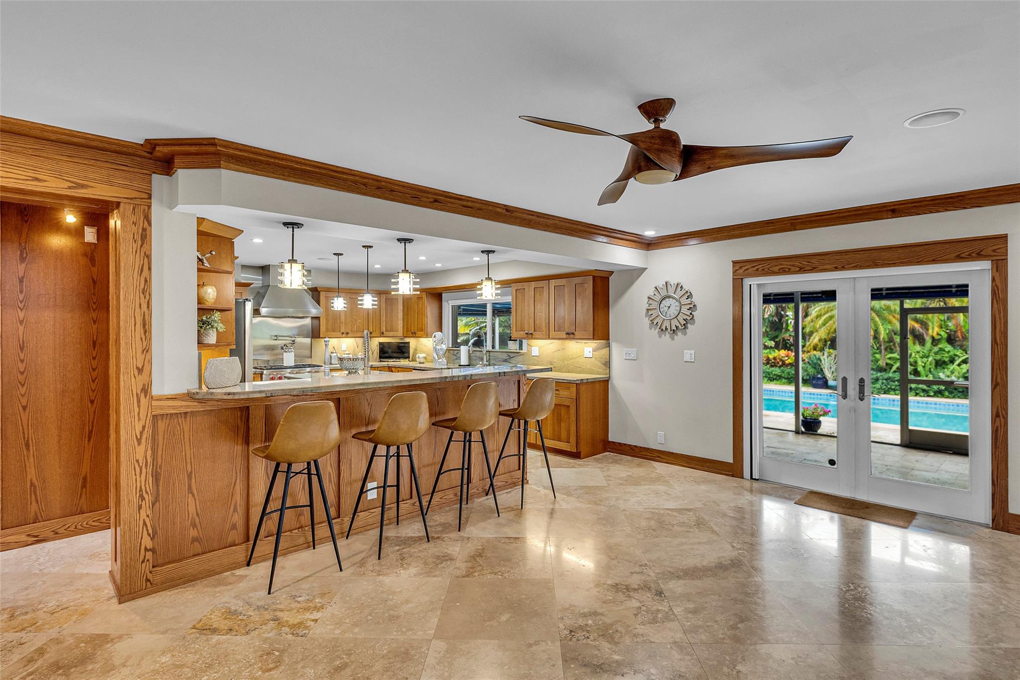 Exceptional value meets elegant living in this Wilton Manors beauty! Totally reconstructed in 2012, this 2,916 SF 3BD/3.5BA plus loft/home office offers high-end upgrades. Enjoy a chef’s kitchen w/ Wolf appliances, granite counters, and luxe finishes. Indulge in seamless indoor/outdoor living with a private pool (heated & chilled!), outdoor kitchen, wet bar, —perfect for entertaining surrounded by lush tropical landscaping. Oversized 1st-floor primary suite boasts 1.5 baths & sitting area. Impact windows & doors, whole house generator w/ 500-gal tank, 2.5-car garage & room for 7 vehicles in circular driveway. A luxury lifestyle investment that makes sense. Experience resort-style living in Wilton Manors! Minutes to Wilton Drive restaurants and parks, Fort Lauderdale beach and airport.
