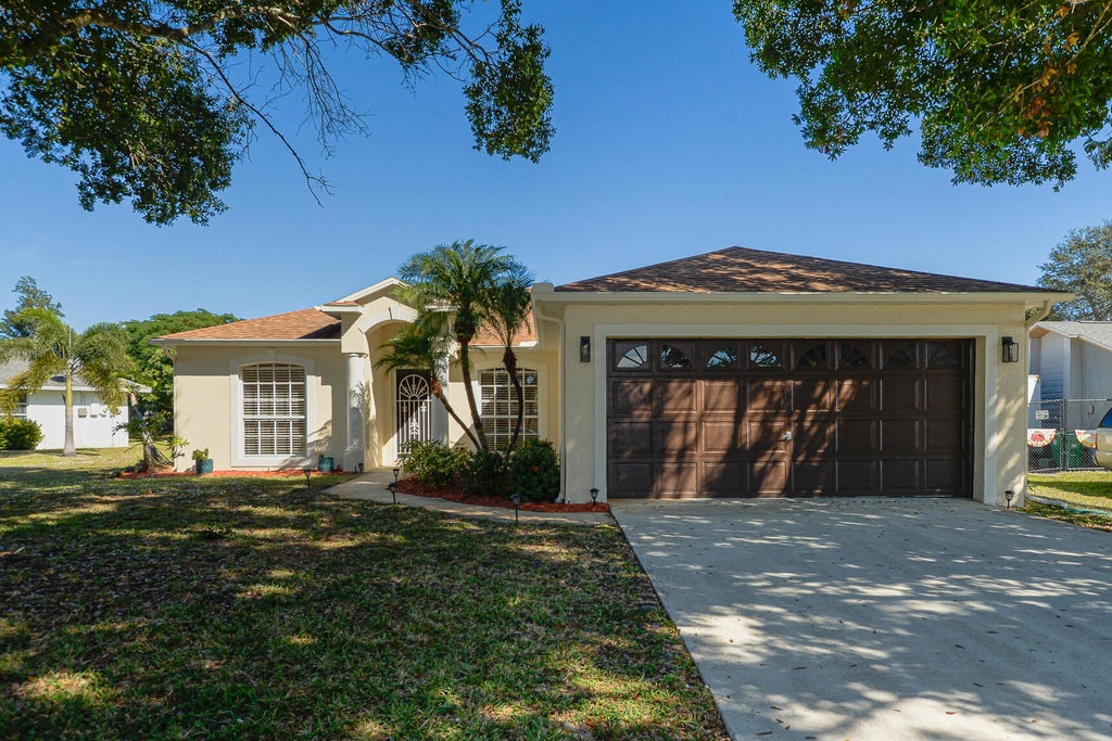 Photo of 2201 SE Carnation Road, Port Saint Lucie, FL 34952 (MLS # R11142701)
