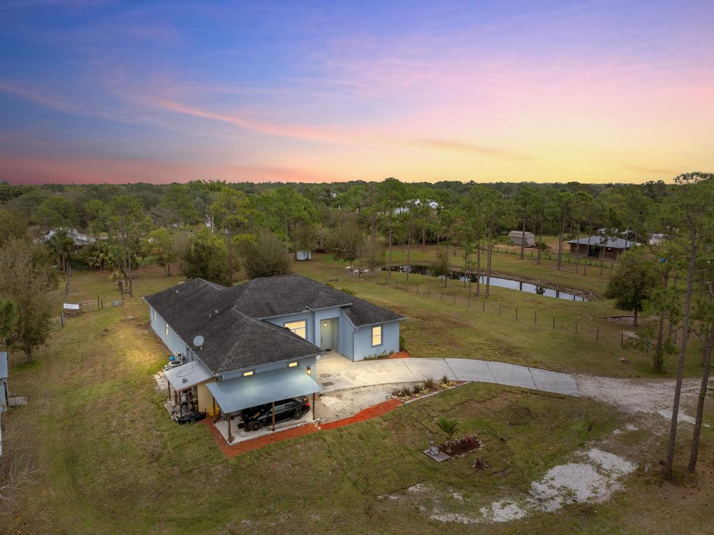 Photo of 6347 SW Travers Street, Palm City, FL 34990 (MLS # R11169389)