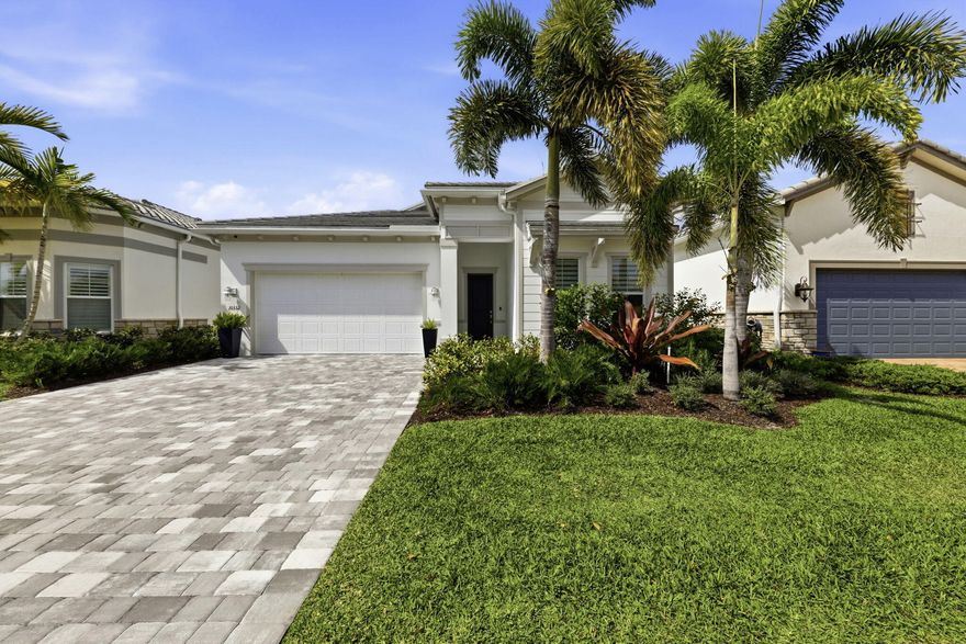 Popular Prestige Model!  Experience modern luxury in this stunning 2-year-old located in the highly sought-after Avondale at Avenir community. Thoughtfully designed Prestige model with over $165,000 in premium finishes, this residence offers the perfect blend of style, comfort, and contemporary living.  Situated on a beautiful lakefront lot, the home features sweeping water views that create a serene backdrop from morning to sunset. Expansive windows fill the interior with natural light, highlighting the open-concept layout and high-end details throughout.  The gourmet kitchen is a showstopper with upgraded double stacked cabinetry, quartz countertops, and top-tier appliances including a gas stovetop. An open floorpan, with upgraded floor tiles, flows seamlessly to the expanded patio. Retreat to the luxurious primary suite, complete with a spa-inspired bathroom and tranquil lake views. The primary bath has upgraded polished quartz countertops, enhanced shower wall tile extended to the ceiling, and upgraded secondary bath finishes, delivering a spa-like feel. Additional bedrooms and flexible living spaces offer room for guests, a home office, or hobbies.  Located in Avenir, one of Palm Beach County's premier new construction communities, residents enjoy world-class amenities including a resort-style clubhouse, pools, fitness center, tennis and pickleball courts, miles of walking trails, and a vibrant, growing town center.  The Avenir Town Center opening in Summer of 2026 will have an array of grocery, retail, dining, services, and everyday conveniences, creating a walkable, golf-cart-friendly environment. Somerset Academy Charter School and firehouse are now open nearby as well as Jupiter Medical Center opening this year with 29 beds. Golf lovers will appreciate nearby, world-class courses such as Panther National, Sandhill Crane Golf Club, The Nest Par 3, and PGA National Resort.  This is your chance to own a nearly new, highly upgraded home in a master-planned community known for its lifestyle, convenience, and natural beauty.  This home is truely better than new and ready for immediate occupancy.