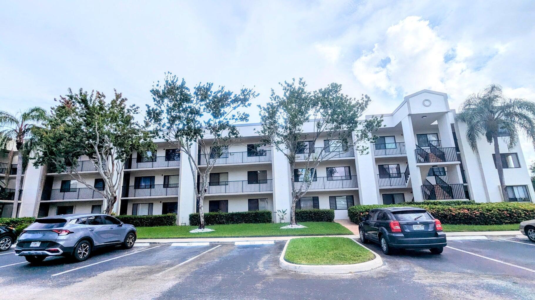 LARGE SPLIT 2/2 WITH A WATER VIEW NEAR TO ELEVATOR, Reserved Parking in front of unit. There is a huge clubhouse (60,000 plus sq ft) and separate 1000 seat theater! In the clubhouse, there is a heated pool, whirlpool, sauna, billiard room, business center, fully equipped gym, arts and crafts room, meeting rooms, and innumerable clubs and activities, If you like pickleball, tennis, ping pong, or mahjongg, bridge and canasta, this is the place for you! The community offers a courtesy bus, neighborhood clubhouses and pools in addition to the main Clubhouse. If you are 55 plus, please take a look! You will be so glad you did! =