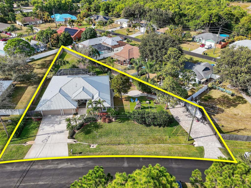 Photo of 3221 SE Quay Street, Port Saint Lucie, FL 34984 (MLS # B26039004)