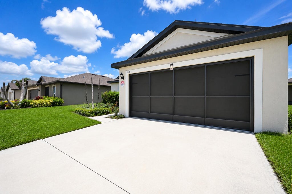 Photo of 5318 Imagination Drive, Fort Pierce, FL 34947 (MLS # B26058462)