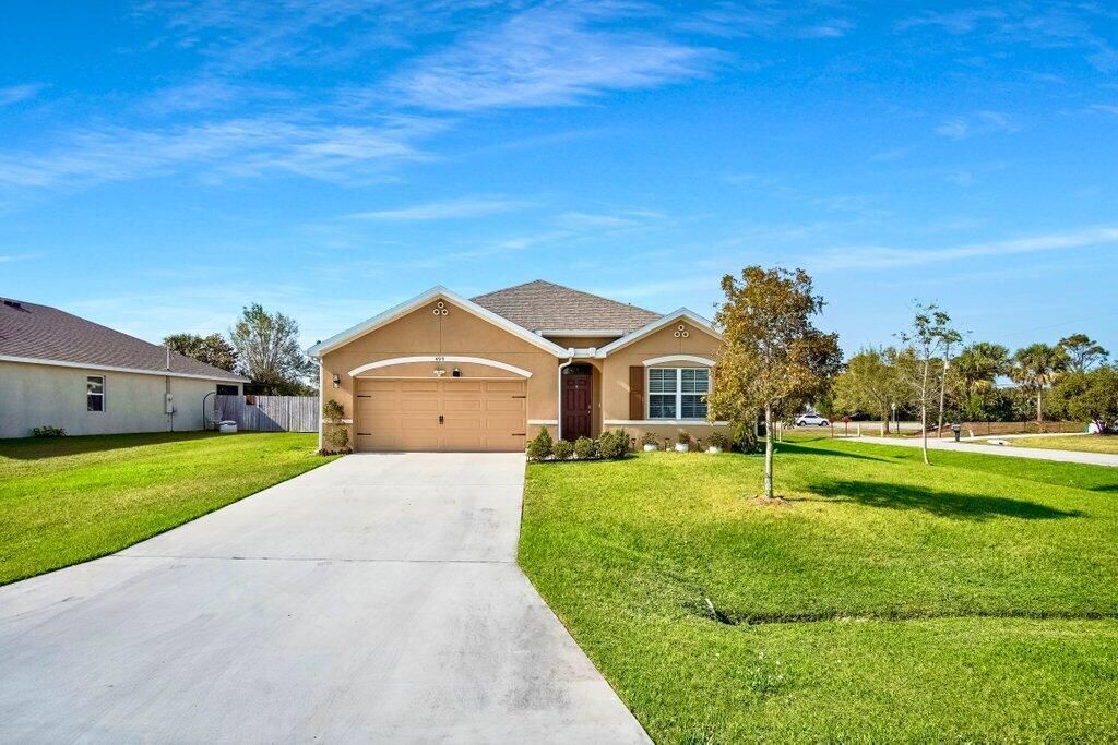 Photo of 499 SE Wallace Terrace, Port Saint Lucie, FL 34983 (MLS # R10872276)