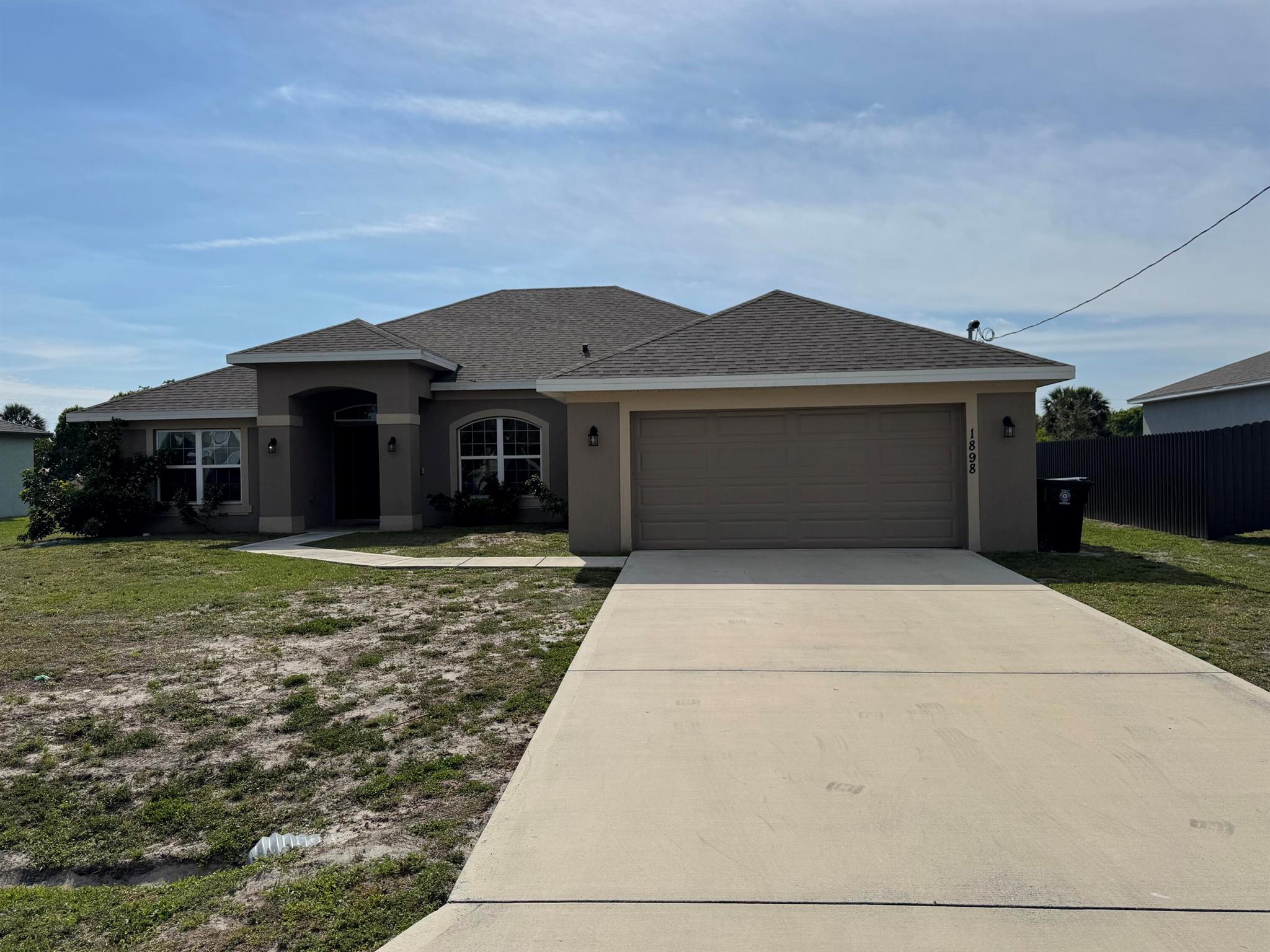 Enjoy this spacious 4 bedroom /3 bathroom/2 car garage home with a split floor plan, covered lanai, open-concept floor plan, large primary suite with walk-in closets, 2 vanity sinks. Located the beautiful SW area with several other new homes nearby, schools, parks and shopping.