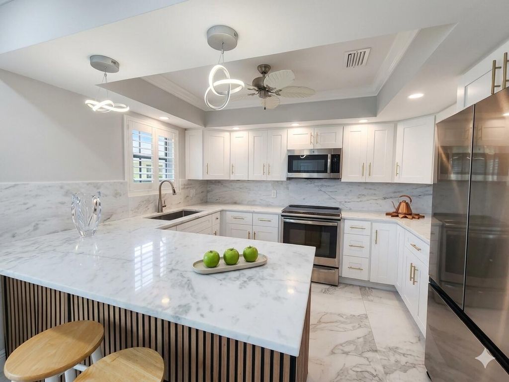 Photo of 75 Venetian Drive #D-11, Delray Beach, FL 33483 (MLS # B26021520)