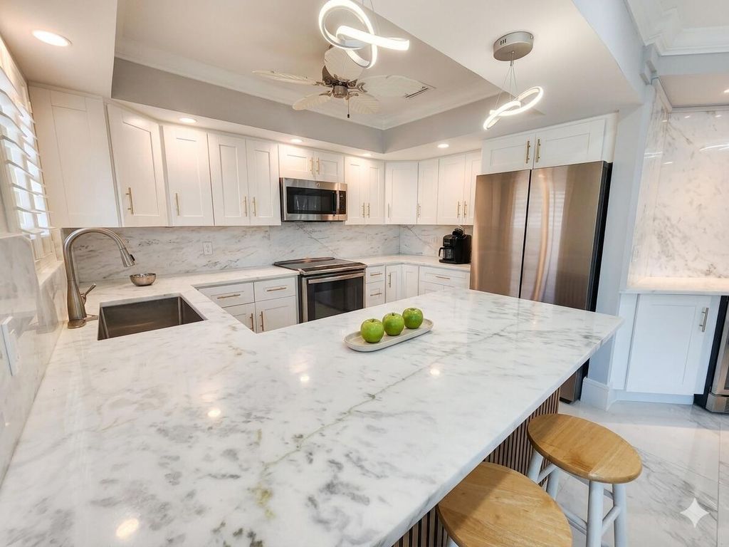 Photo of 75 Venetian Drive #D-11, Delray Beach, FL 33483 (MLS # B26021520)