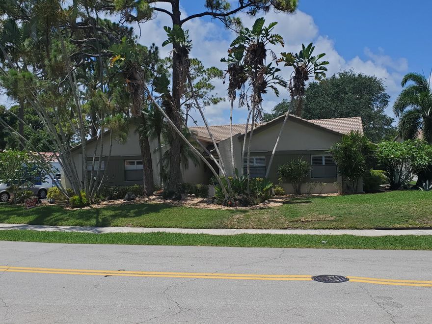 4 Bedroom 3.5 Bath Domed Screened pool, Huge lot on Timbercreek Lake. Total Sq Ft 3,474 A/C'ed 2,509 - Huge back yard, over 80' from pool to Lake! Wonderful plants & trees, Sprinklers off Lake, Great Home for Entertaining, glass door sliders to Roofed pool-side porch from Family, Living & Master rooms all with unobstructed Lake Frontage! Kit. remodeled w/custom Maple cabinets, granite counters & stainless steel appliances. Vaulted Ceilings: Kit., Family & Living rooms, Master Bath renovated 2004, LED lights, New sprinkler pump & updated sprinklers, Hurricane protection for all windows, Flat roof 8 yrs old, Barrel tile roof installed 2001, new pool screen 2018, Leaf-guard gutters 2018, exterior water spigets 3 yr's old, much more. Timbercreek: Parks, Picnic areas, sidewalks, Lakeside Walks Spectacular Lakefront Beauty on almost 1/2 Acre. Nicely Updated with Tile Throughout with 2000 Sq Ft Screened in Patio with Pool on nicest Lot in Timbercreek. 4 Bedroom 3.5 Bath Domed Screened pool, Huge lot on Timbercreek Lake. Total Sq Ft 3,474 A/C'ed 2,509 - Huge back yard, over 80' from pool to Lake! Wonderful plants & trees, Sprinklers off Lake, big saving on water bill. Great Entertaining possibilities with large Domed screened pool patio with glass door sliders to Roofed pool-side porch from Family, Living & Master rooms all with unobstructed Lake Frontage! Patio wall mounted flat screen TV included. Kit. remodeled w/custom Maple cabinets, granite counters & stainless steel appliances, Filtered water for Frig. & Sink. Vaulted Ceilings: Kit., Family & Living rooms, Amana A/C 13 yr's old, most appliances under 5 yr's old, frig 6, hot water heater 5, new faucets in 3 bathrooms, Master Bath renovated 2004 with double sinks, Jacuzzi & double shower with hand held & jets besides shower head, multiple cabinets, LED lights throughout, New sprinkler pump & underground sprinkler heads, overhauled pool cleaner, Child Pool fence in garage. Hurricane panels & accordion shutters throughout, Armour screen for patio & front entrance, Patio Flat roof 8 yr's old, barrel tile roof 2000 New Pool screen enclosure in 2004, new screen 2018, leaf-guard gutters 2018, all new water spigots under 3 yr's old. Portable 7500 Watt Hurricane Generator tuned up w/new battery. ADT Security System throughout. TIMBERCREEK -an Arvida Jewel with several Parks,  Roofed picnic area, sidewalks both sides of street & Lakeside walks - HOA takes care of these amenities for only $103.33 per mo.