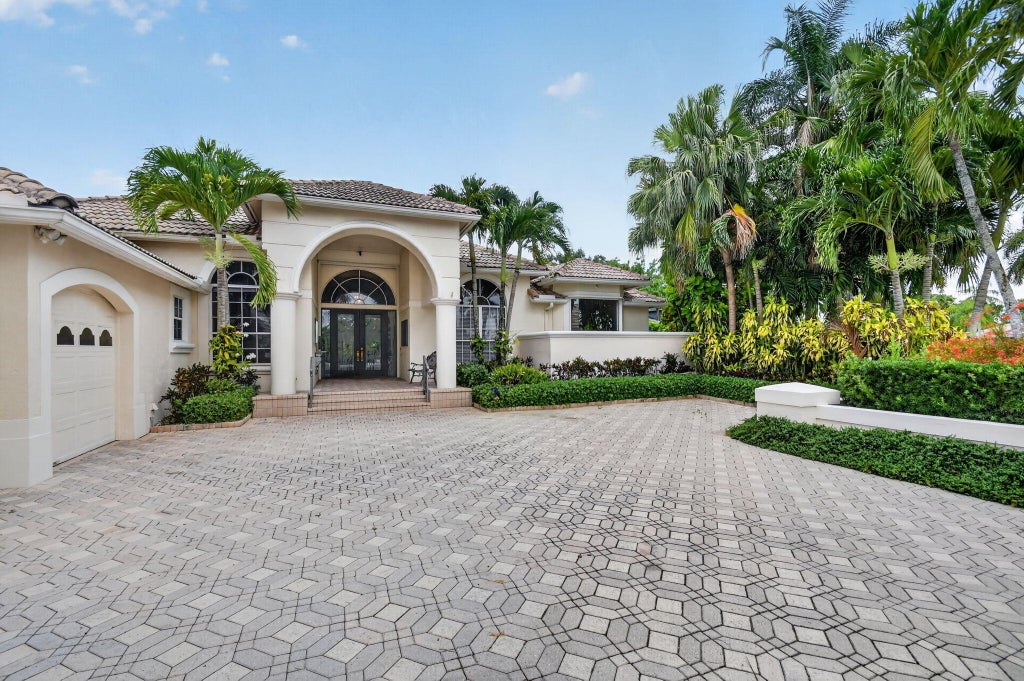 Photo of 4936 Exeter Estate Lane, Lake Worth, FL 33449 (MLS # B26048522)