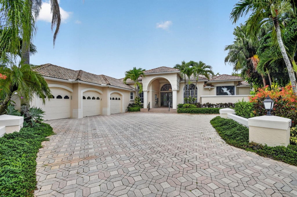 Photo of 4936 Exeter Estate Lane, Lake Worth, FL 33449 (MLS # B26048522)