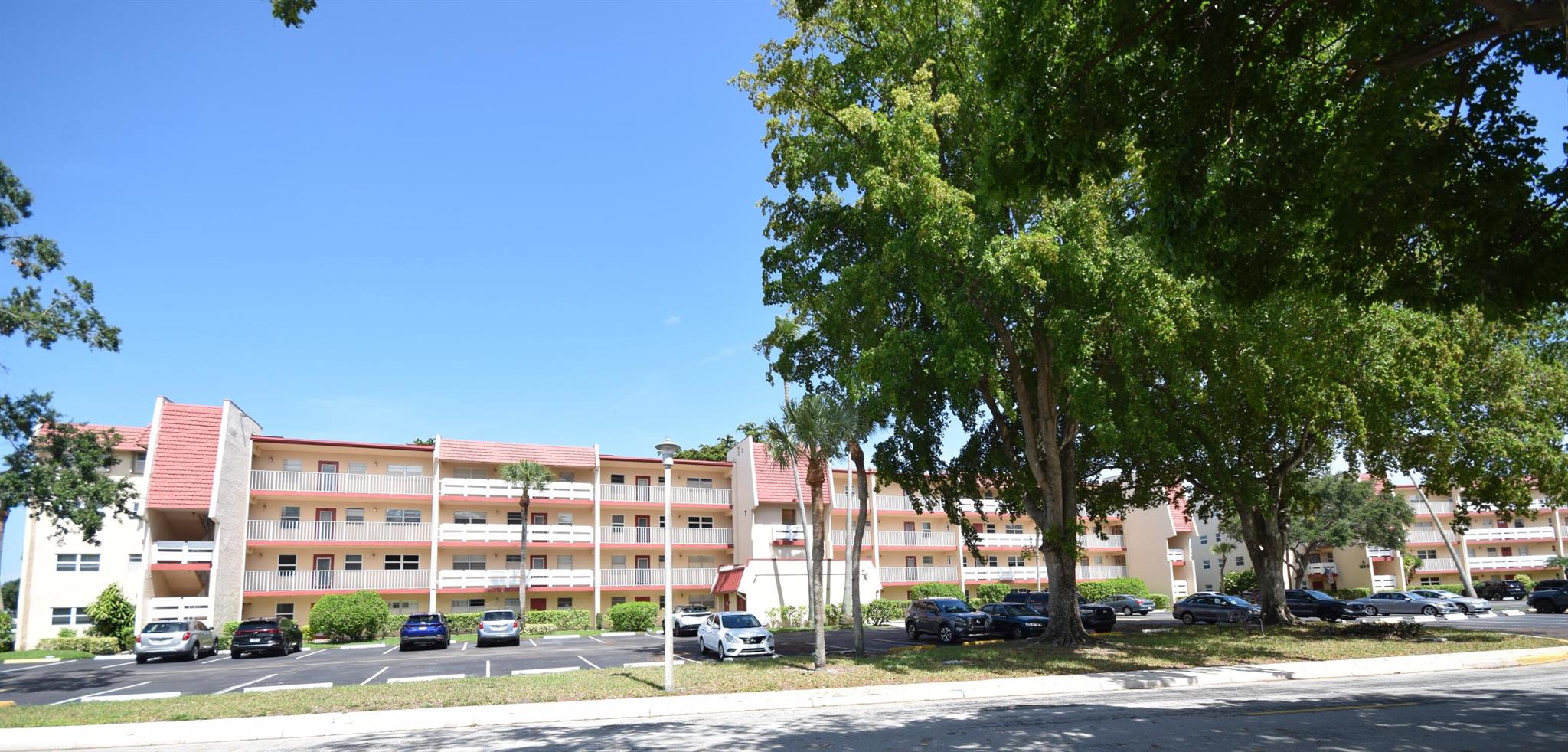 Enjoy serene golf course views and resort-style amenities in this spacious 1-bedroom, 1.5-bath condo located in the sought-after Oriole Golf & Tennis Club, a premier 55+ community in Margate. Perfectly situated on the second floor of an elevator building, this charming unit offers a screened-in balcony overlooking lush fairways--ideal for morning coffee or sunset relaxation. Inside, you'll find a thoughtfully designed layout with a generously sized primary bedroom that features an expansive walk-in closet and private en-suite bathroom. A convenient half bath is available for guests. The bright and airy living and dining area offers ample space for entertaining and flows seamlessly to the outdoor balcony. This condo is move-in ready or can serve as a blank canvas for your personal updates.