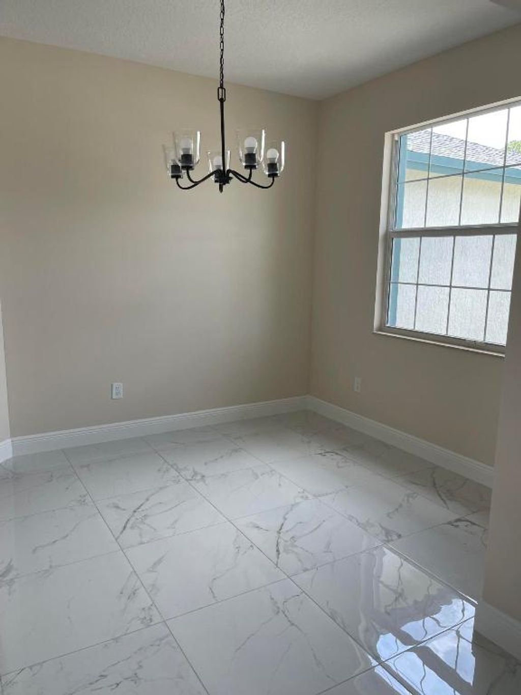 Photo of 2117 SW Tampico Street, Port Saint Lucie, FL 34953 (MLS # R10996726)
