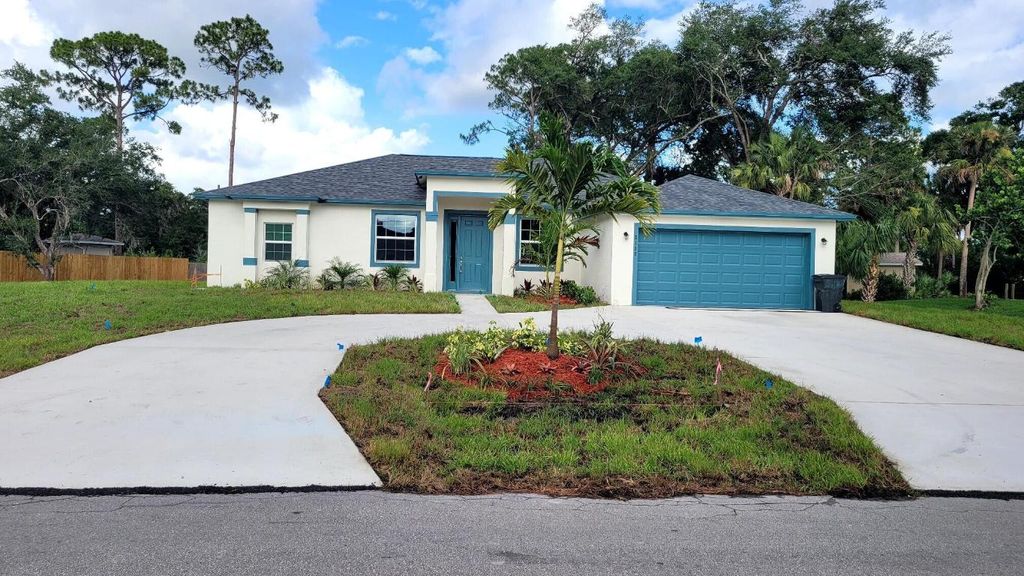 Photo of 2117 SW Tampico Street, Port Saint Lucie, FL 34953 (MLS # R10996726)