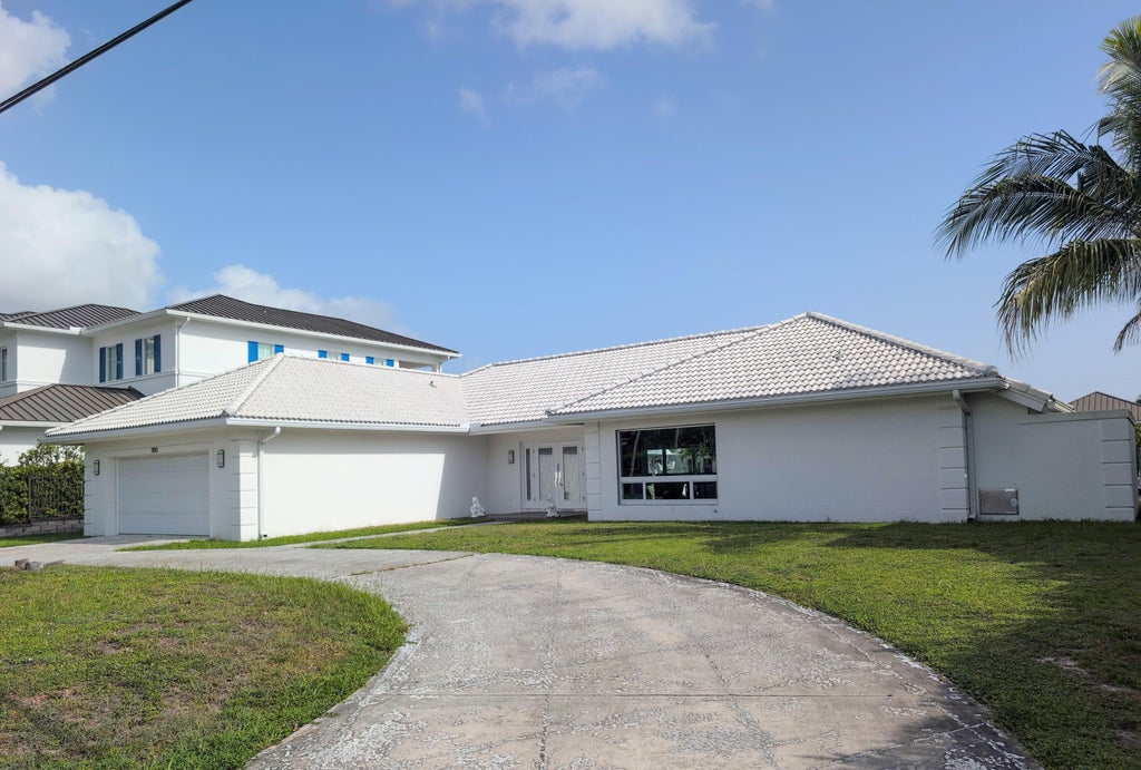 Photo of 1190 Bimini Lane, Riviera Beach, FL 33404 (MLS # B26056387)