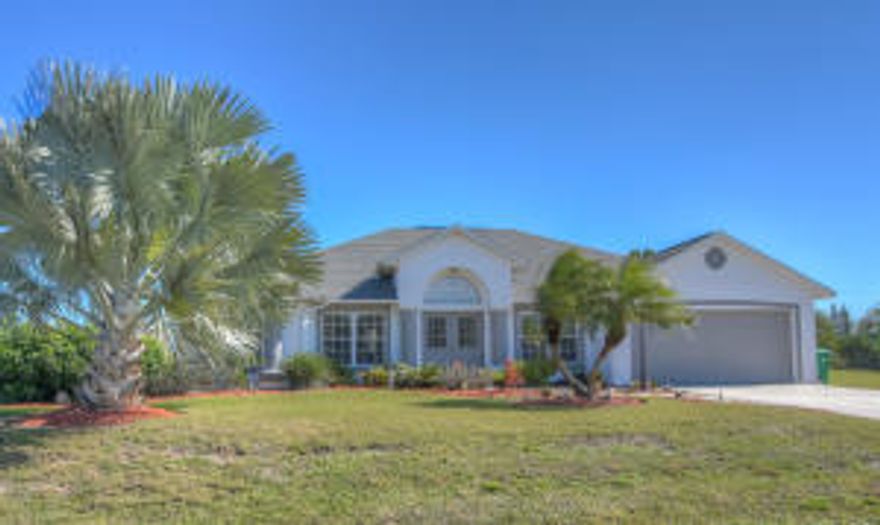 This is the home you’ve been searching for! Located in the highly sought after area of Paar Estates on a spacious half-acre, this newer CBS home is move-in ready. All flooring in bedrooms, light fixtures & fans were replaced in 2009. The kitchen features newer countertops, all brand new Samsung stainless steel appliances, walk-in pantry, & breakfast bar. The master suite features a walk-in closet & large bath with double sinks, tub, & separate shower. The whole home is light & bright. Enjoy the sunny south Florida weather on your patio & take a dip in your pool that is fenced. Conveniently located in close distance to grocery stores, shopping, & major highways.