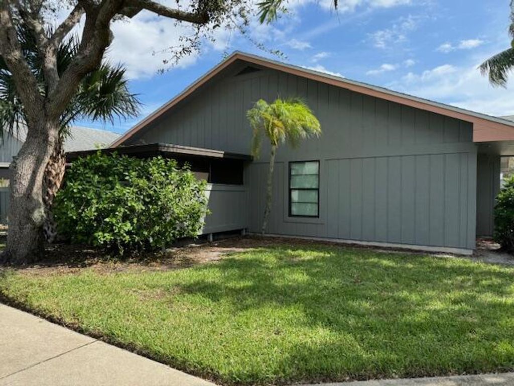 Photo of 4065 NW Cinnamon Tree Circle, Jensen Beach, FL 34957 (MLS # R11090418)