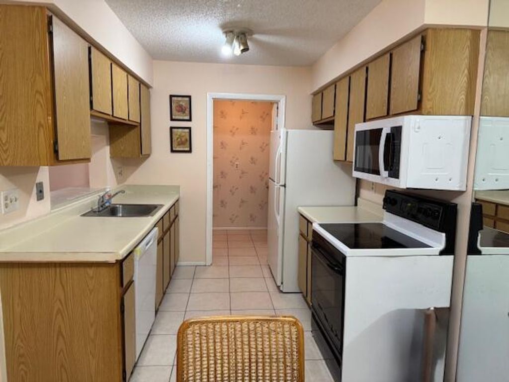 Photo of 4065 NW Cinnamon Tree Circle, Jensen Beach, FL 34957 (MLS # R11090418)