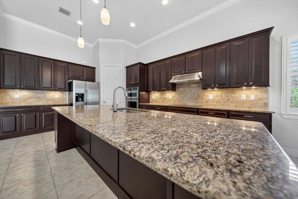 Photo of 4601 SW Scrub Pine Terrace, Palm City, FL 34990 (MLS # B26015899)