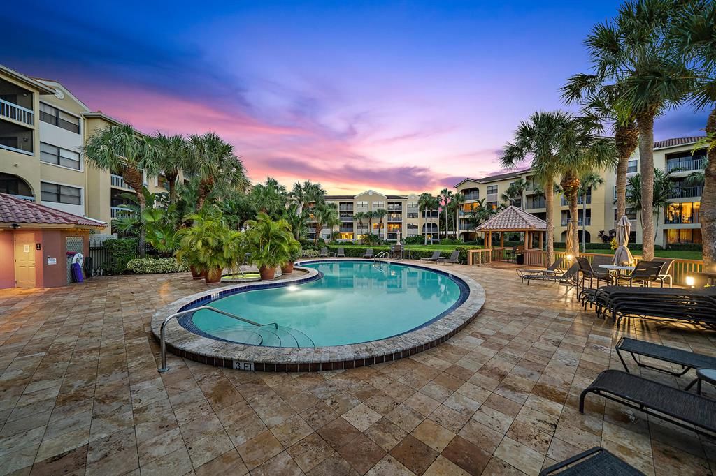 Photo of 100 Uno Lago Drive Dr #102, Juno Beach, FL 33408 (MLS # R10812791)