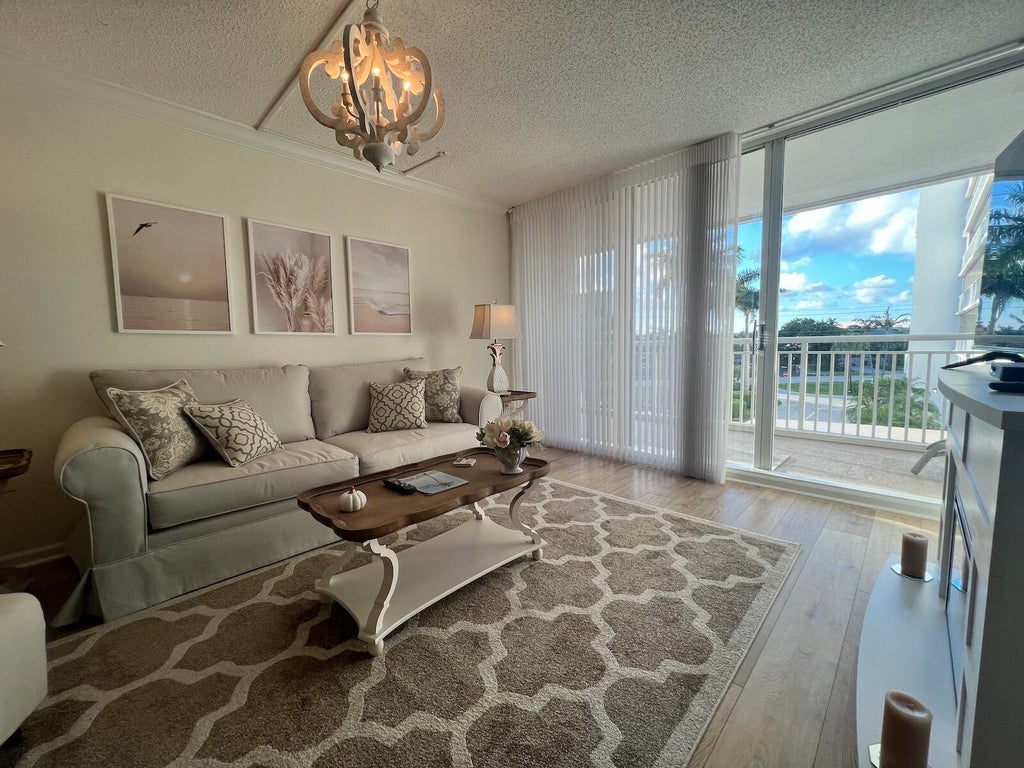 Photo of 3546 S Ocean Boulevard #315, South Palm Beach, FL 33480 (MLS # B26074058)