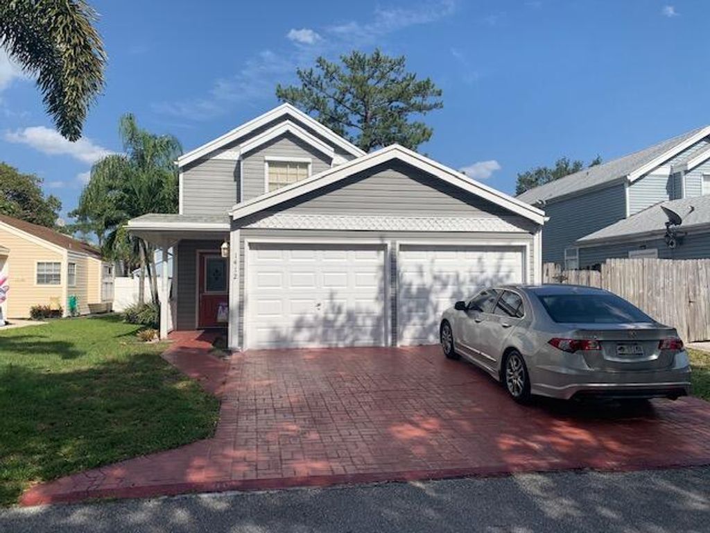 Photo of 1412 Amaryllis Lane, West Palm Beach, FL 33415 (MLS # R10791643)