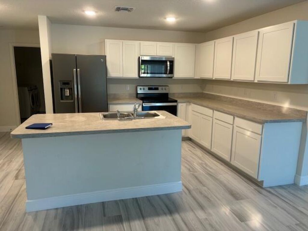 Photo of 2231 SE Mariposa Avenue, Port Saint Lucie, FL 34952 (MLS # R10926921)