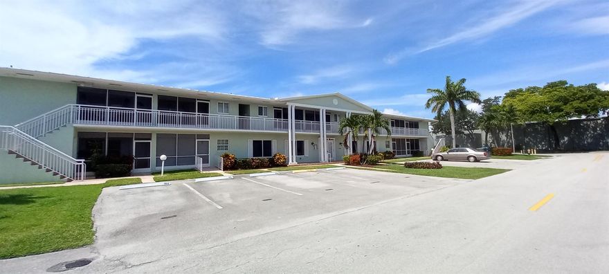 Recent upgraded 1st floor co-op in pristine 55+ Lighthouse Point complex. Very attractive apartment in shades of contemporary colors. Popular gray wood grain tile flooring throughout. Wow new kitchen with wood cabinetry, stone counter tops and new appliances. Sharp bathrooms remodeled with new vanities and tile surfaces. Recessed ceiling lights in every room. Great feature is your own washer and dryer in the unit. Screened patio faces courtyard amenities 3 resident gathering areas with barbecues, newly renovated heated pool and shuffleboard . Impact glass storm protection.  Assigned parking space # 129 and 2 guest parking are right at your door. Short walk to banks, shopping, restaurants, bus stops, post office and library.  No renting for 1st 5 years of ownership.