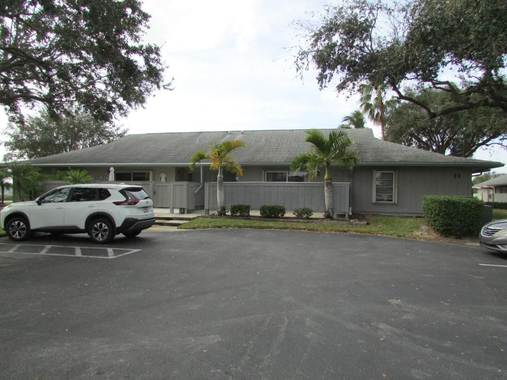 Photo of 3980 NW Cinnamon Tree Circle, Jensen Beach, FL 34957 (MLS # R10942764)