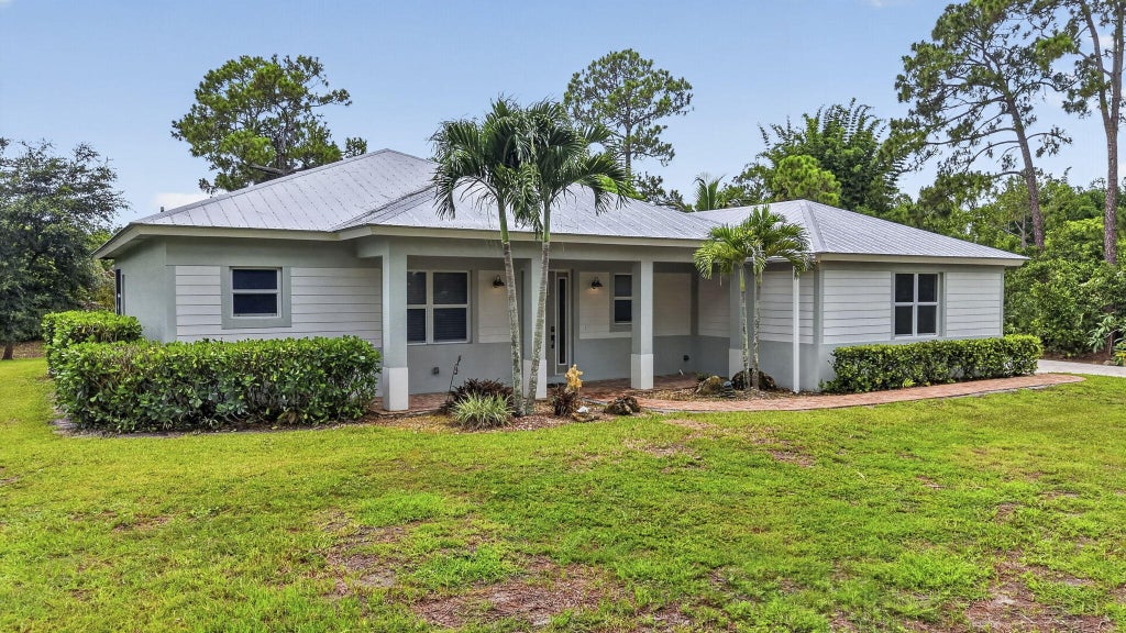 Photo of 18842 93rd Road N, The Acreage, FL 33470 (MLS # B26046564)