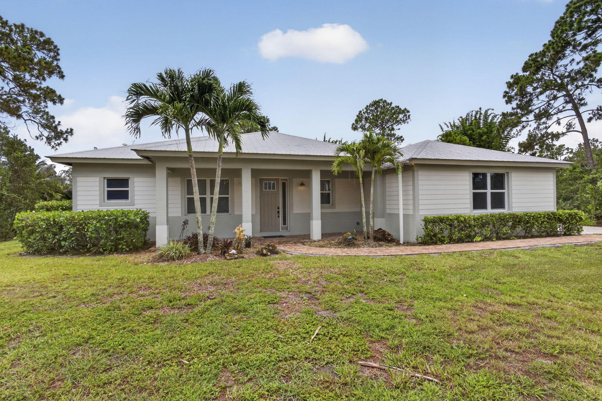 Photo 1 of 56 — 18842 93rd Road N, The Acreage, FL 33470