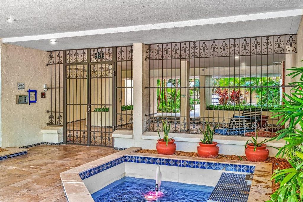 Photo of 23200 Camino Del Mar #107, Boca Raton, FL 33433 (MLS # R10982664)