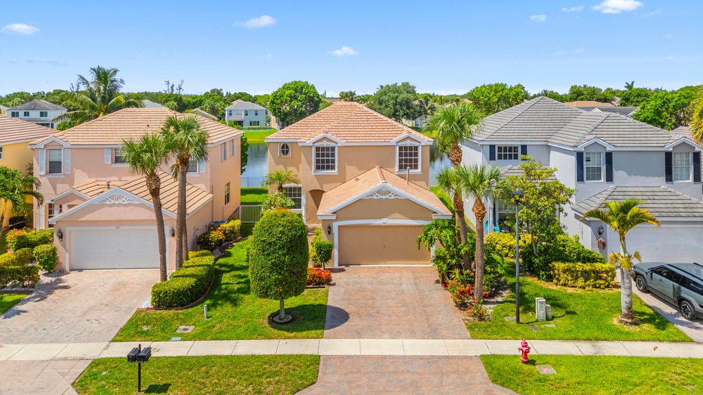 Photo of 143 Hamilton Terrace, Royal Palm Beach, FL 33414 (MLS # B26048023)