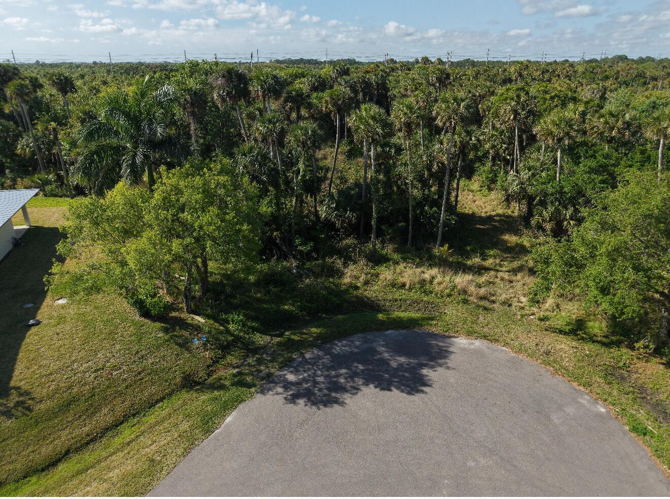 DISCOVER THIS 0.52 ACRE LOT IN WHITE CITY LOCATED ON A QUAINT CUL-DE-SAC. WITH MAXIMUM PRIVACY & ONLY ONE NEIGHBOR, THIS LOT COULD BE THE SITE OF YOUR FOREVER HOME. THE REAR OF THE PROPERTY ABUTS 7.75 ACRES OF COUNTY CONSERVATION LAND & TO THE WEST OF THE LOT IT ABUTS 5.01 ACRES OF COUNTY CONSERVATION. SEE COUNTY MAP PHOTO IN LISTING. IF THAT WASN'T ENOUGH, THE SITE HAS CITY WATER & METER IN PLACE. LOWER COUNTY ONLY TAXES. ENJOY THE CLOSE PROXIMITY TO US1, 95, BEACHES, SHOPPES & RESTAURANTS OF DOWNTOWN WITHOUT CONTESTING WITH HEAVY TRAFFIC. CALL FOR DETAILS BEFORE THIS COVENANT PROPERTY IS SNATCHED UP!