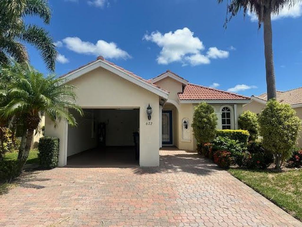Photo of 672 SW Treasure Cove, Port Saint Lucie, FL 34986 (MLS # R10993251)